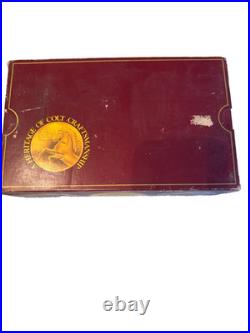 Colt handgun box, specifically identified as a maroon 150th-anniversary box