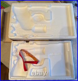 Colt handgun box, specifically identified as a maroon 150th-anniversary box