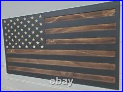 Hidden handgun storage. American flag gun concealment cabinet. Wall stash case